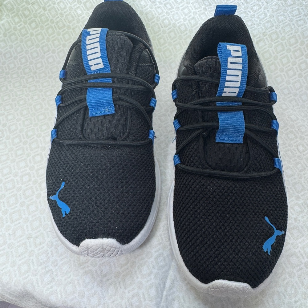 PUMA Kids Sneakers in Black with Blue Highlights
